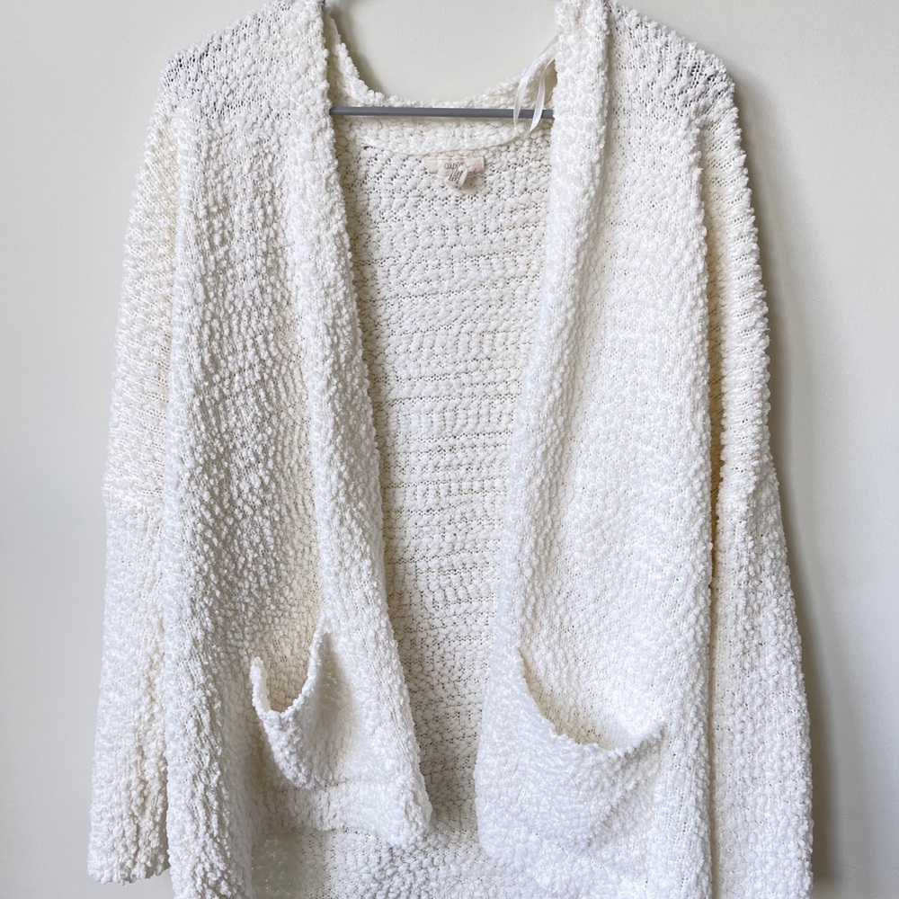 white cardigan/ sweater